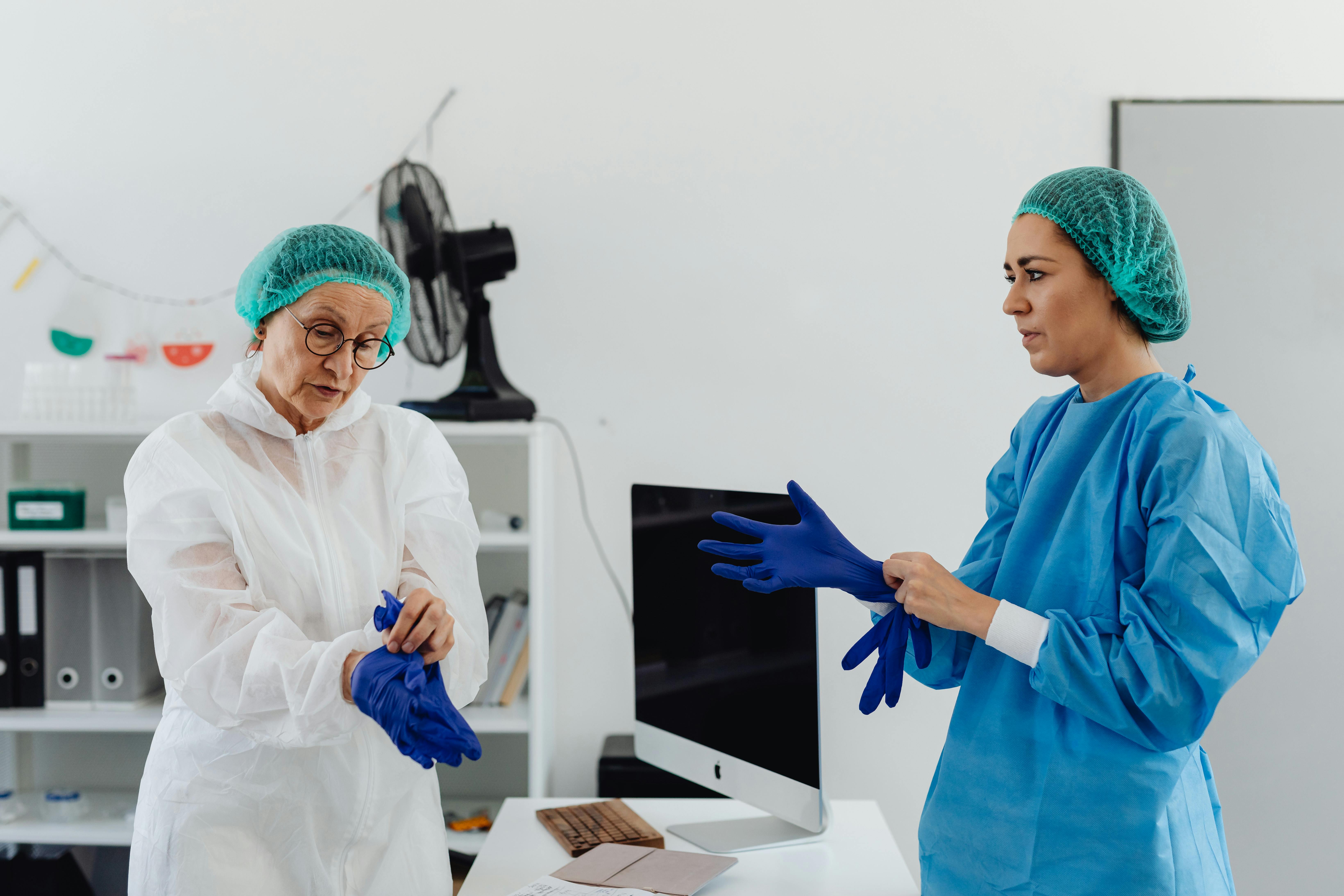 Scientists preparing in a pharmaceutical workspace